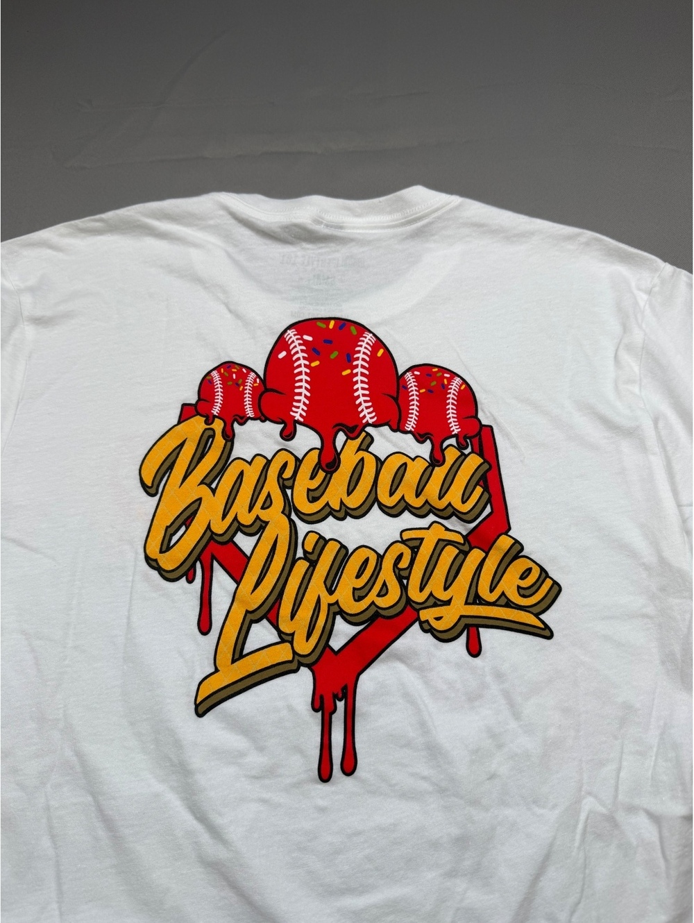 Baseball Lifestyle 101 white graphic T-shirt red drip logo